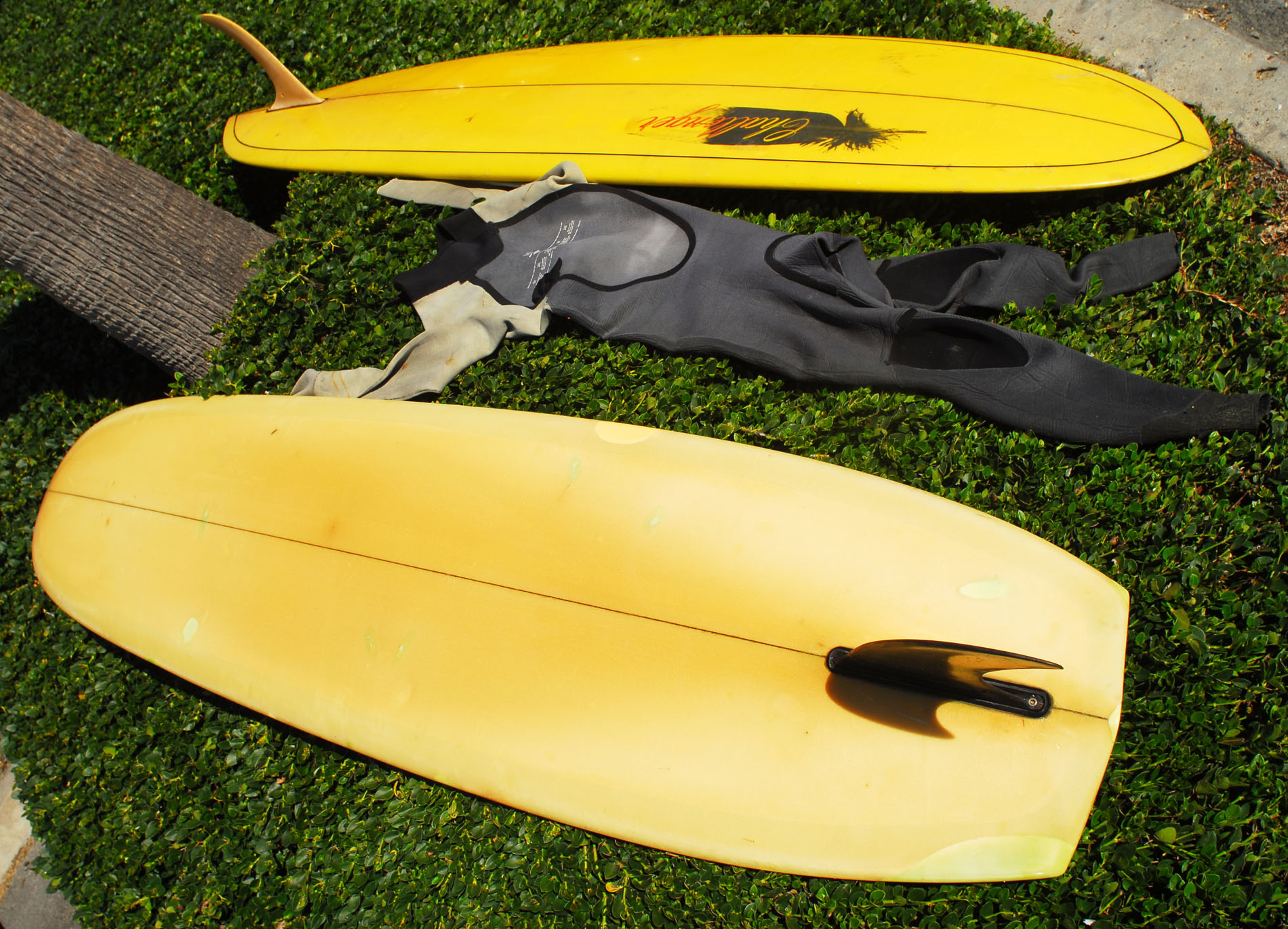 V bottom surfboards in Swamis parking lot